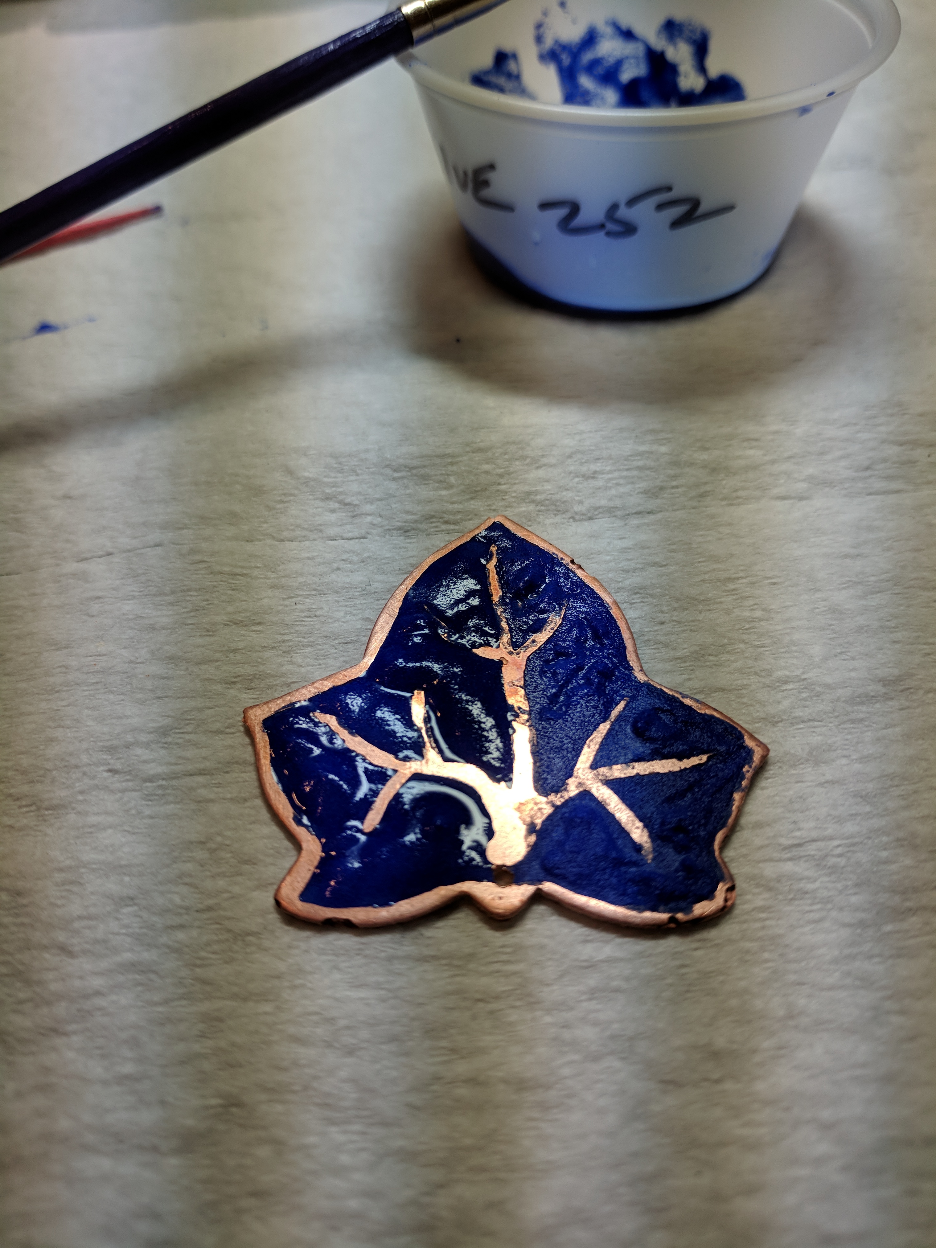 My first enameling! The copper leaf with blue enamel. Tons of fun.